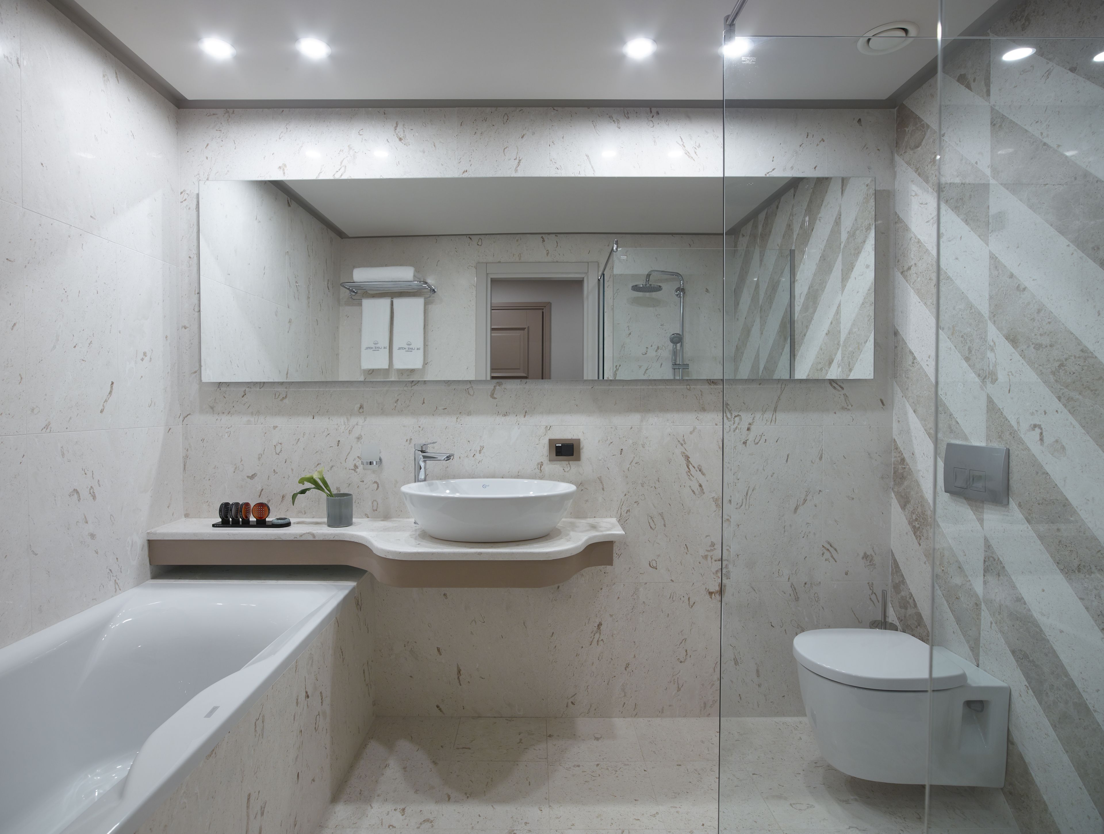 deep-soaking bathtub, free toiletries, hair dryer, bathrobes