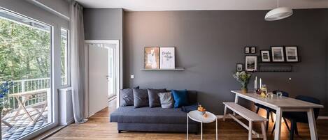 Family Apartment, 1 Queen Bed with Sofa bed (53m²) | Living area | 40-cm TV with digital channels