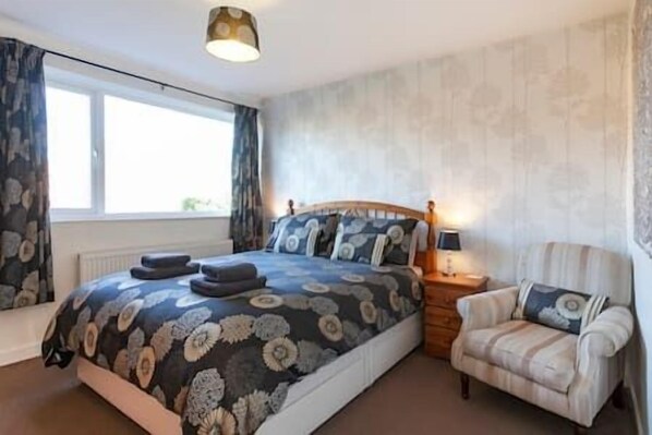 4 bedrooms, iron/ironing board, travel cot, WiFi