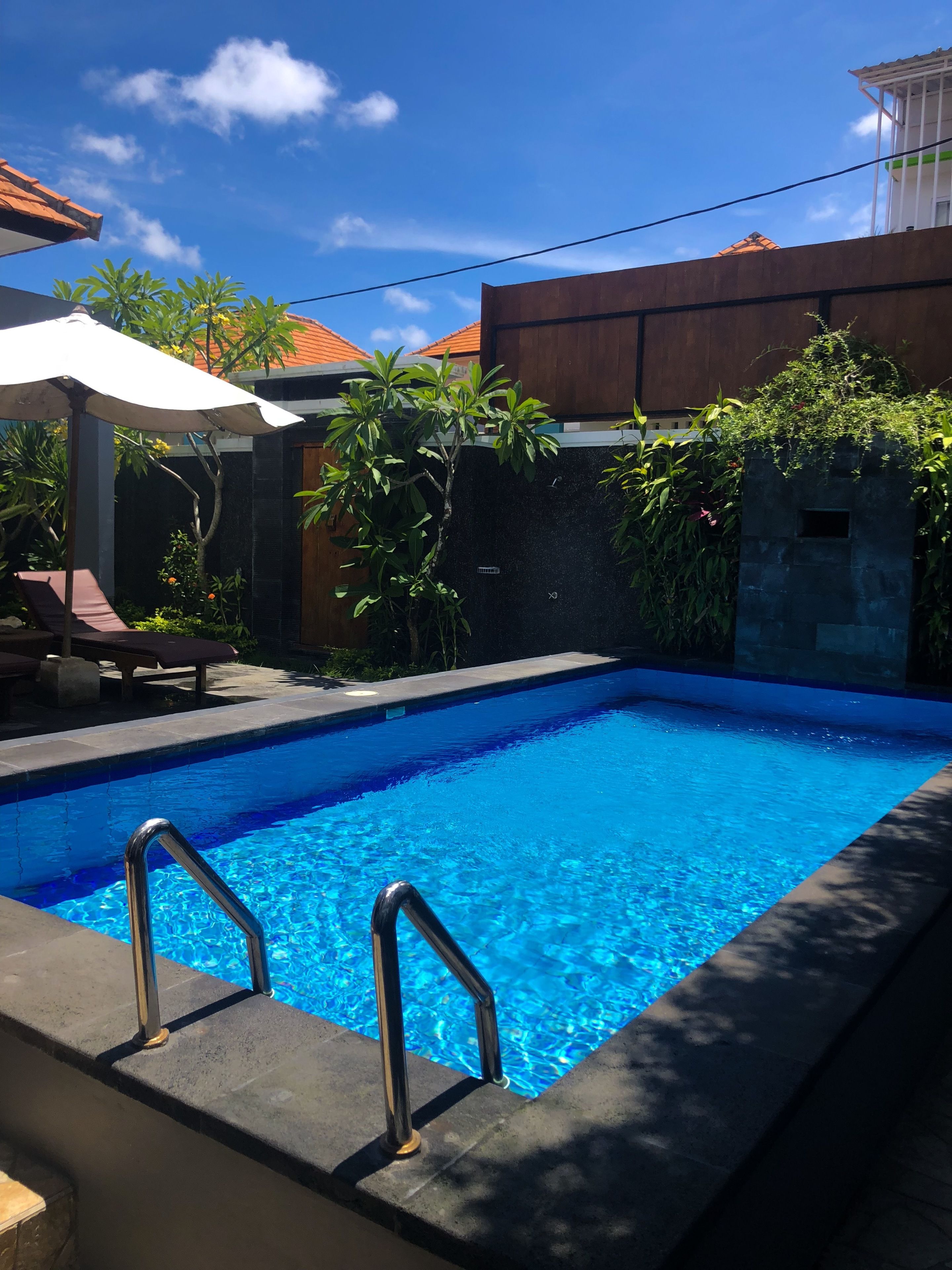 Outdoor pool, pool umbrellas, pool loungers