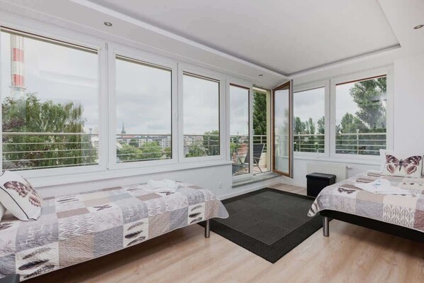 2 habitaciones, tabla de planchar con plancha, wifi y ropa de cama 