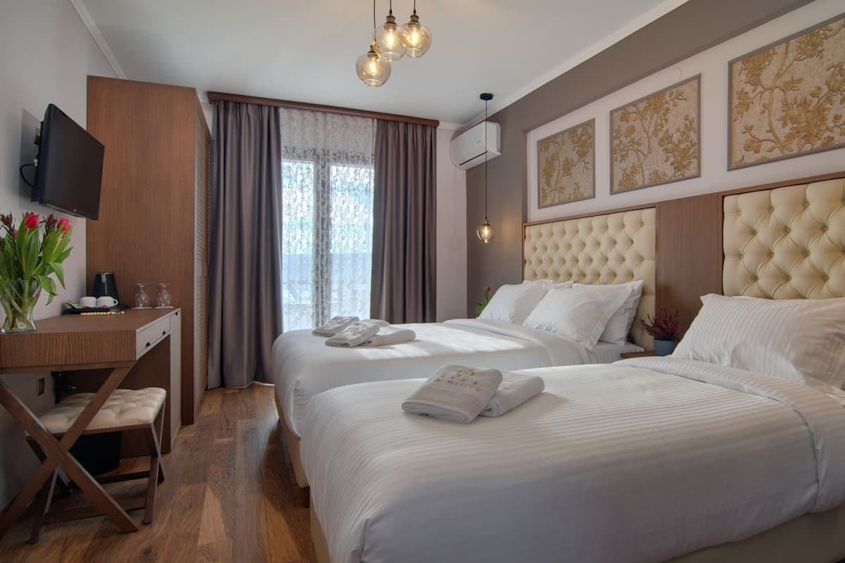 Deluxe-Dreibettzimmer