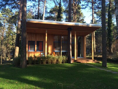 beautiful wooden house with exclusive furnishings and panoramic windows on Schwielowsee