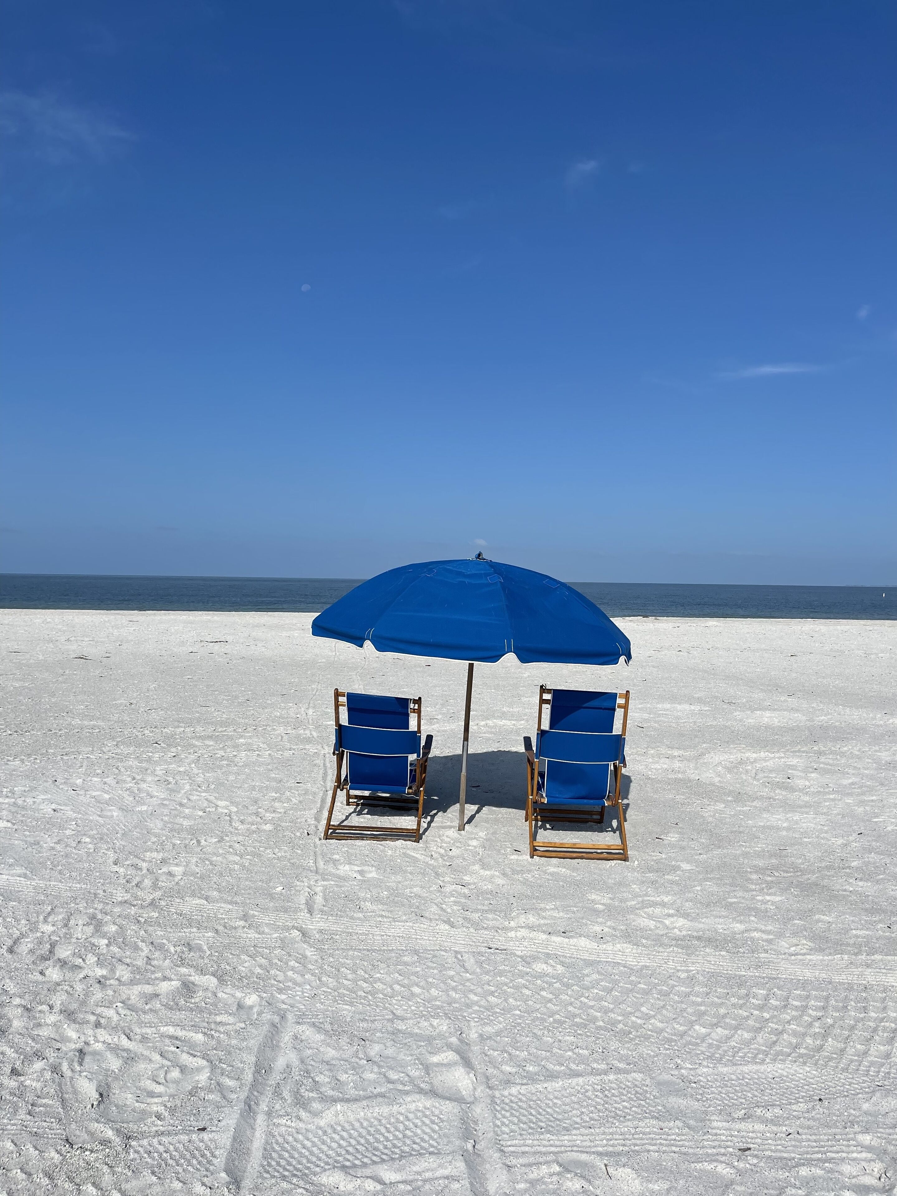 On the beach, sun loungers, beach towels
