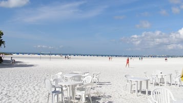 On the beach, sun loungers, beach towels