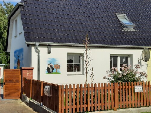 Ferienhaus (DHH) am Kubitzer Bodden mit Kamin und großem Garten