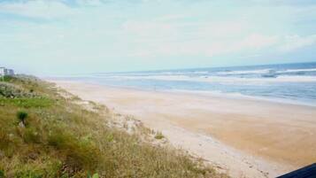 On the beach, sun loungers, beach towels
