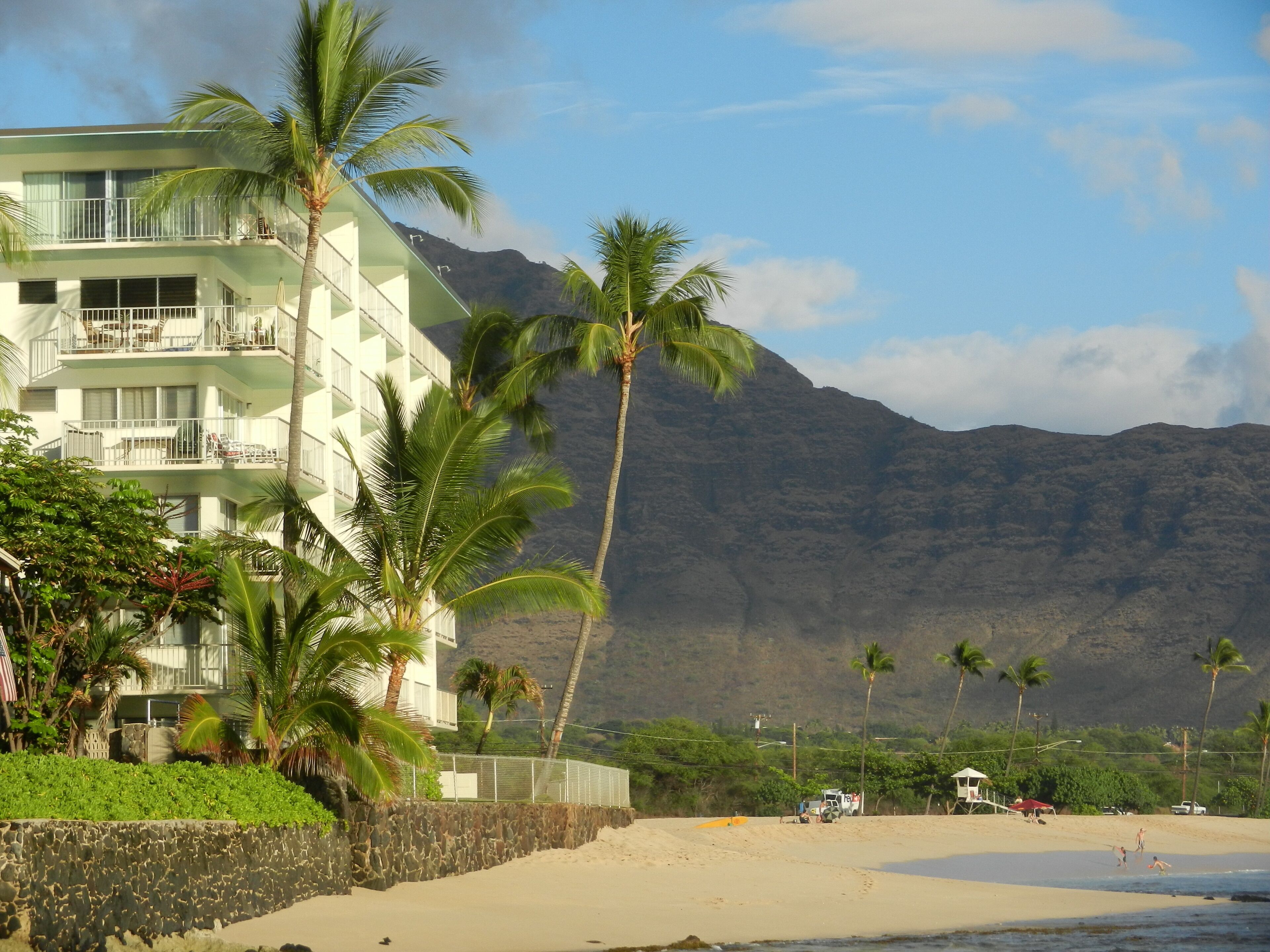 On the beach, sun loungers, beach towels