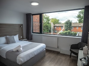 Premium bedding, blackout curtains, free WiFi, bed sheets
