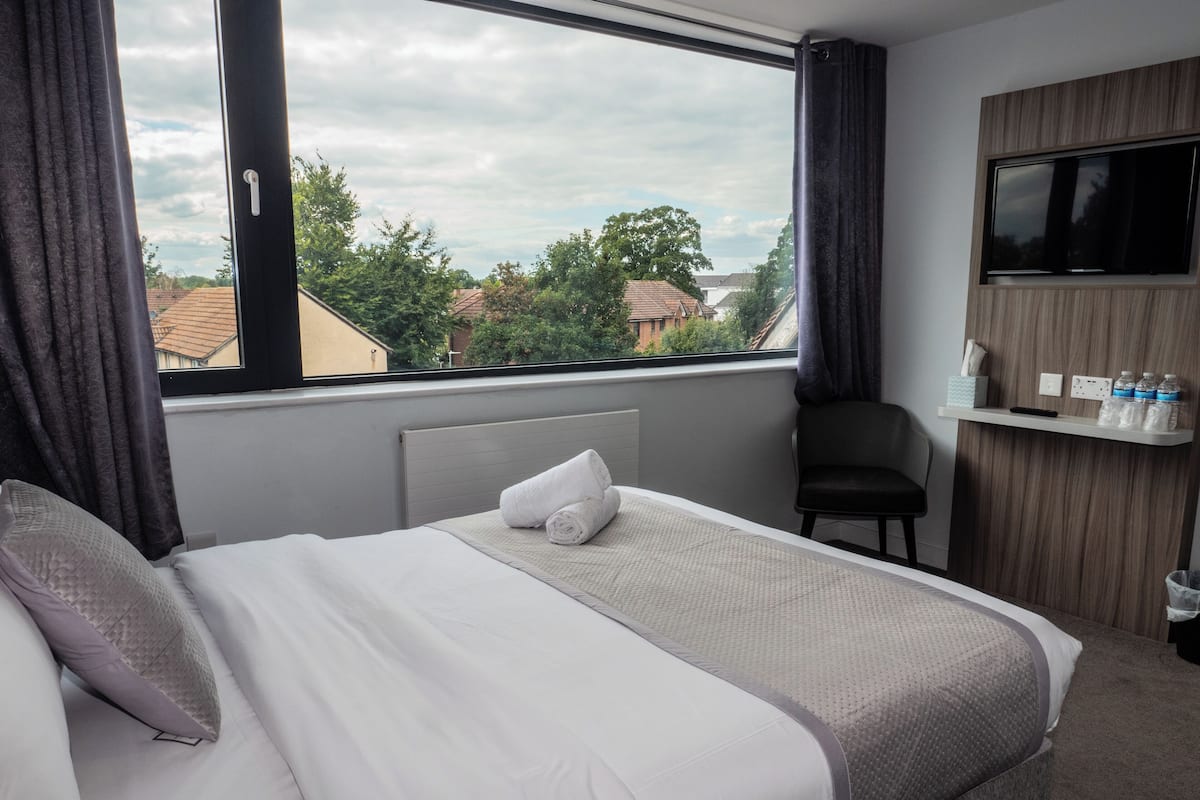Premium bedding, blackout curtains, free WiFi, bed sheets