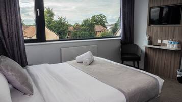 Luxe beddengoed, verduisterende gordijnen, gratis wifi, beddengoed