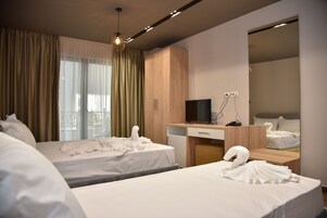 Standard Triple Room, Balcony | In-room safe, iron/ironing board, rollaway beds, free WiFi