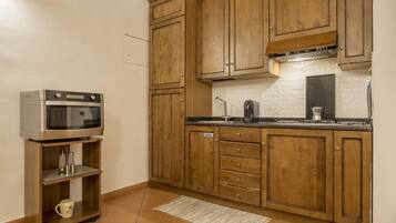 Departamento, 2 habitaciones | Cocina privada | Refrigerador con congelador, horno y parrilla de estufa