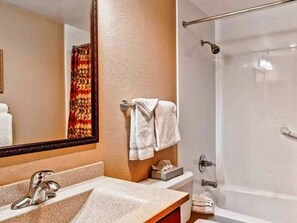 Hair dryer, towels, soap, shampoo