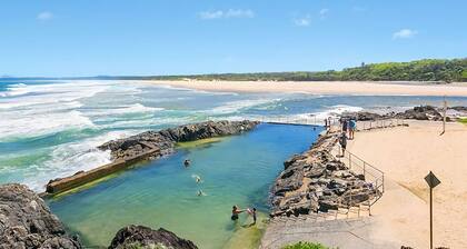 Ocean Sands 5 is a fully furnished two bedroom unit located on the first floor, next to the beach.