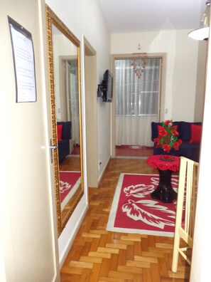 Apartment, Multiple Beds | Living room | 32-inch LED TV with cable channels, TV