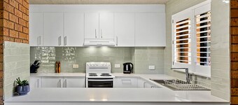 Enjoy the convenience of this two bedroom ground floor apartment close to the beach.