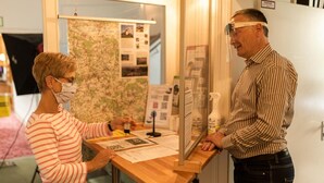 A reception desk with a map and informational posters. - Havergoh Wander- & Fahrrad-Hotel (Horn-Bad Meinberg)