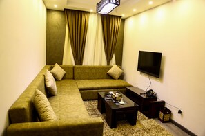 32–tuumainen LCD-televisio, jossa satelliittikanavat