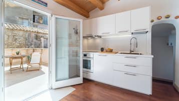 Appartamento, 2 camere da letto | Cucina privata | Frigorifero con congelatore, forno, piano cottura, lavastoviglie