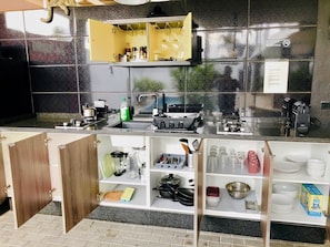 Fridge, coffee/tea maker, electric kettle, toaster