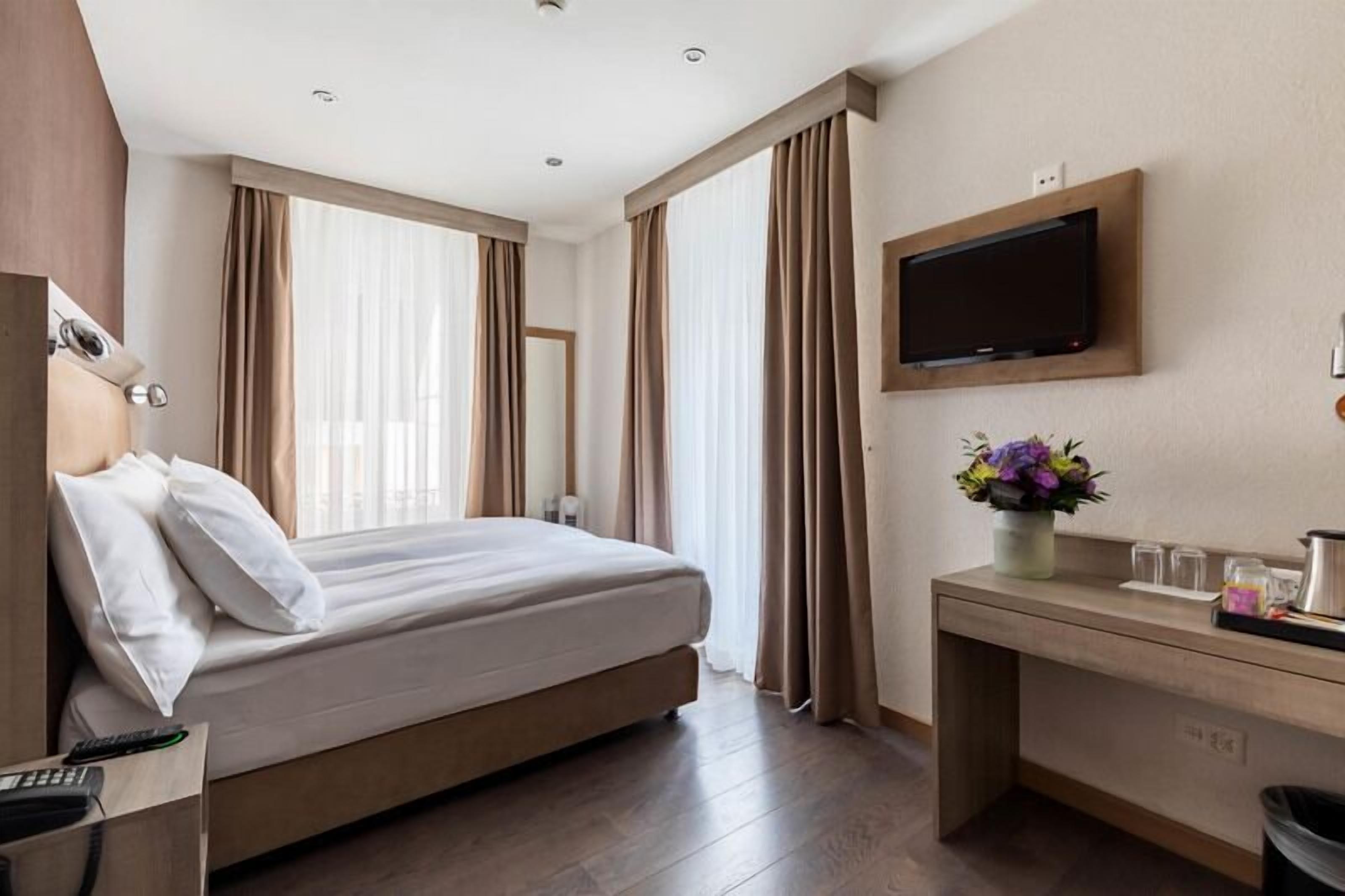 double or twin room | hypo-allergenic bedding, desk, soundproofing, free cots/infant beds