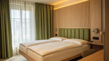 Double or Twin Room | Hypo-allergenic bedding, desk, soundproofing, free cribs/infant beds