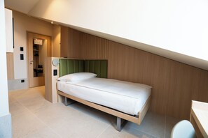 Standard Single Room | Hypo-allergenic bedding, desk, soundproofing, free cribs/infant beds - Le Square (Geneva)