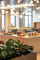 Daily buffet breakfast (CHF 15 per person)