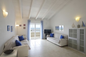 Appartement, 2 chambres | Aire de séjour | Téléviseur à écran plat