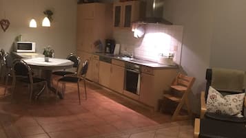 Appartement Confort, vue jardin | Restauration dans la chambre