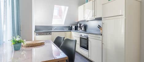 Fridge, microwave, dishwasher, coffee/tea maker