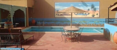 Outdoor pool, pool umbrellas, pool loungers