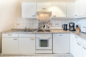 Fridge, microwave, dishwasher, coffee/tea maker