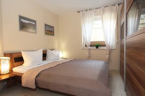 2 bedrooms, travel crib, WiFi, bed sheets