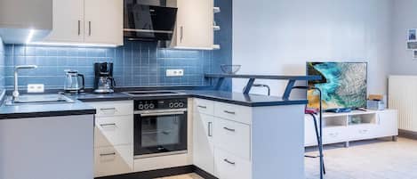 Fridge, microwave, dishwasher, coffee/tea maker