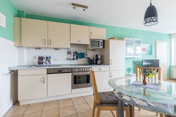 Fridge, microwave, dishwasher, coffee/tea maker