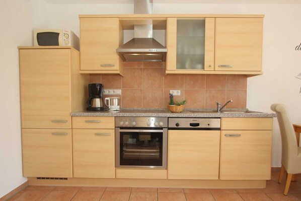 Fridge, microwave, dishwasher, coffee/tea maker