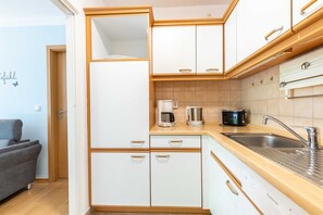 Fridge, dishwasher, coffee/tea maker, electric kettle