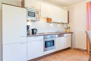 Fridge, microwave, dishwasher, coffee/tea maker