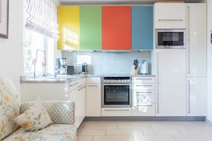 Fridge, microwave, dishwasher, coffee/tea maker