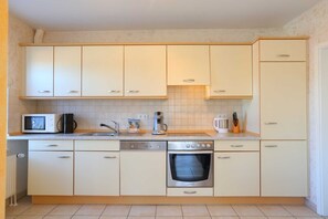 Fridge, microwave, dishwasher, coffee/tea maker