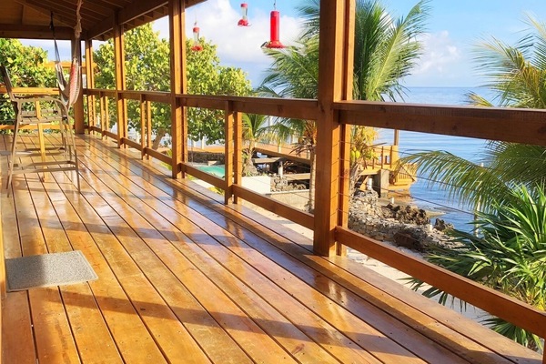 Expansive deck with sweeping views of Gibson Bight and the beautiful Caribbean.