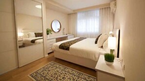 Superior Suite, 1 Bedroom | Tempur-Pedic beds, laptop workspace, blackout curtains, soundproofing - Modern TLV (Tel Aviv)