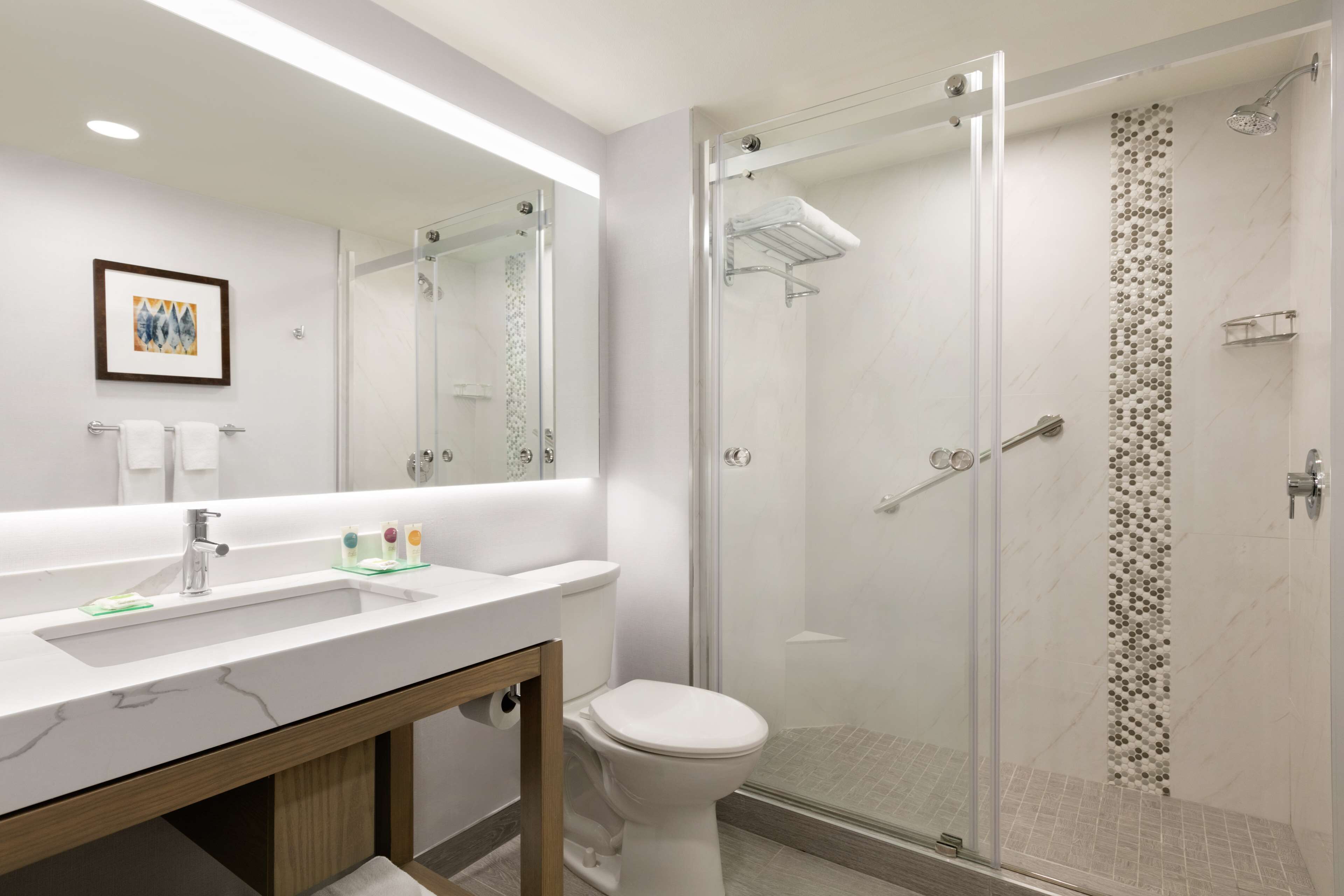 designer toiletries, hair dryer, bathrobes, towels