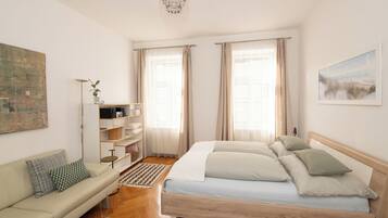 1 habitación, tabla de planchar con plancha, wifi gratis y ropa de cama