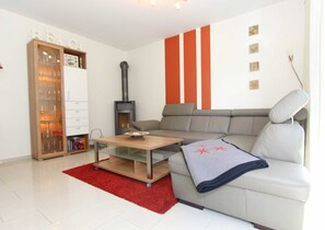 Fernseher, Kamin