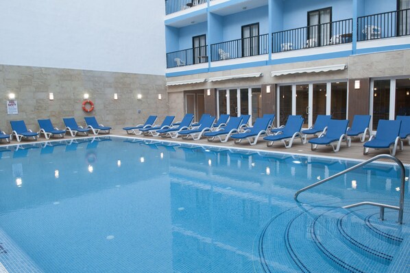 Indoor pool, seasonal outdoor pool, pool umbrellas, sun loungers