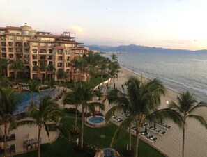 On the beach, sun-loungers, beach towels - 5th Floor Wow views, BradAndJoeyRentals Closest to ocean - Villa La Estancia (Nuevo Vallarta)