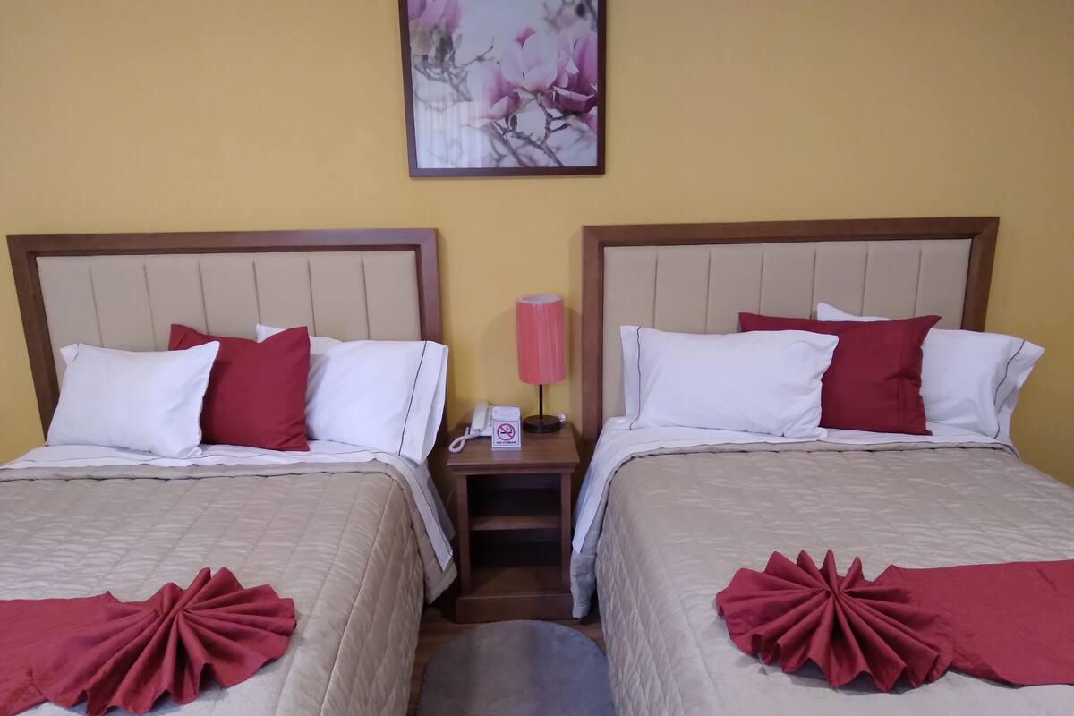Standard Room, 2 Queen Beds, Non Smoking | In-room safe, desk, blackout drapes, iron/ironing board (on request)